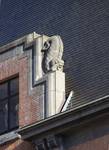 Hôtel communal de Forest, sculpture d'une lucarne (© ARCHistory, photo 2025)
